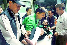 An injured child being taken to the IGMC in Shimla on Friday.
