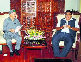 Chief Minister Virbhadra Singh meets Union Minister for Road Transport, Highways and Shipping Nitin Gadkari in New Delhi on Friday.