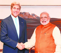 US Secretary of State John Kerry shakes hands with Prime Minister Narendra Modi in New Delhi on Friday.
