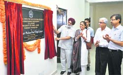 Vice Chancellor Mohan Paul Singh Ishar inaugurates the premises of the International Centre for Cross-Cultural Research and Human Resource Management at University of Jammu on Friday. Tribune photo: Anand Sharma