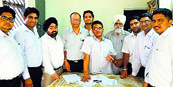 Members of NGO Helpline demand action against contractor and officials of the Sewage Board