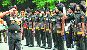 Lt Gen KJ Singh takes salute during a ceremony at Chandimandir on Friday.