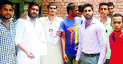 Some of the students with a poster that declared a BCA-I student as their union president
