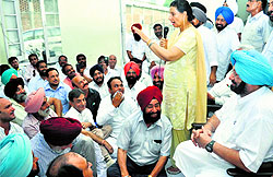 Congress candidate for Patiala Preneet Kaur addresses an election meeting on Friday. Amritsar MP Capt Amarinder Singh is also seen