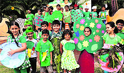 Children dressed up as trees and plants at The British School in Chandigarh on Saturday