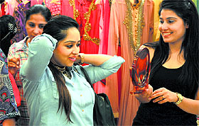designer handbags put on display during an exhibition in Ludhiana.