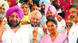 Congress candidate Preneet Kaur and Amritsar MP Capt Amarinder Singh in Patiala on Saturday. Tribune photo: Rajesh Sachar