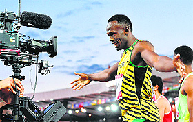 Im the man:  Jamaicas Usain Bolt after competing in the heats of the 4x100m relay at Hampden Park in Glasgow on Saturday. 