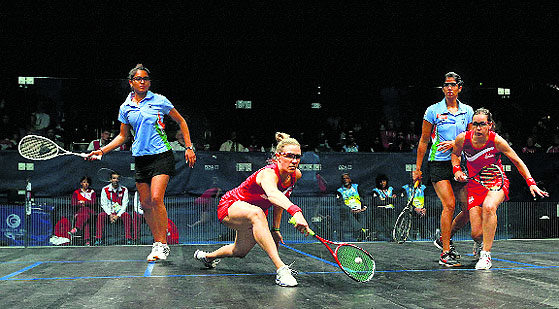 Indias Dipika Pallikal (left) and Joshana Chinappa beat Englands Laura Massaro (second left) and Jenny Duncalf (right) 11-6 11-8 in the final in Glasgow on Saturday. PTI
