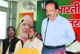 Union Health Minister Dr Harsh Vardhan addresses party workers at the BJPs state office in Dehradun on Saturday