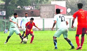 Players in action during a match in the Nemidas Memorial District Football League at Pavilion Ground in Dehradun on Saturday