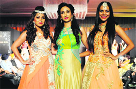 Models show creations by Indian designer Jattinn Kochhar and Sheetal Lyall during a fashion show, Kingfisher Ultra Punjab Style Tour, in Amritsar on Sunday