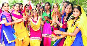 Girls enjoy swing during the Teej celebrations in Bathinda on Sunday.
