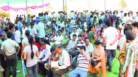 Candidates and their parents jostle for space during the counselling at the gymnasium hall of Panjab University