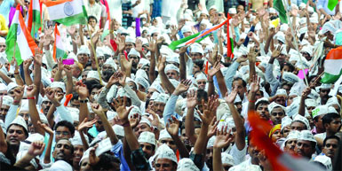 AAP supporters gather during a party rally at Jantar Mantar in New Delhi on Sunday.