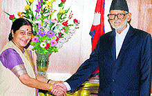 Foreign Minister Sushma Swaraj with Nepalese Prime Minister Sushil Koirala during a meeting in Kathmandu on July 26