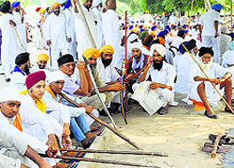 not to be left behind are the HSGMC supporters as they carry guns, swords and lathis, signalling that they are battle-ready