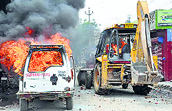 A police van torched by the mob in Faridabad