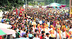 A Minjar procession leads to the Ravi in Chamba on Sunday