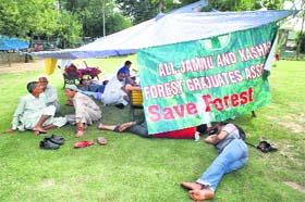 Protest continues: Unemployed forestry graduates rest in their camp during their hunger strike in Srinagar on Sunday. They have been agitating against the state governments failure to approve Rehbar-e-Janglat scheme