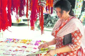 FESTIVE FERVOUR: A woman selects a rakhi ahead of Raksha Bandhan in Jammu on Sunday