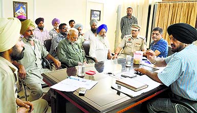ADCP (Traffic) Gurdeep Singh interacts with the representatives of the Auto-rickshaw Union on Sunday.