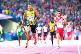 Jamaicas Usain Bolt about to cross the finish line in the 4x100m relay final