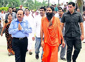 Union Health Minister Dr Harsh Vardhan with yog guru Swami Ramdev at the Patanjali Yogpeeth in Haridwar on Sunday.