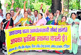 Uttarakhand statehood agitators hold a protest at the District Magistrate camp office in Haridwar on Sunday.