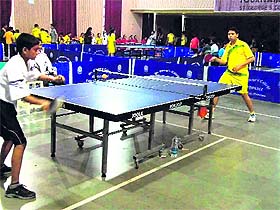 A match in the 10th Manorite Inter-School Table Tennis Tournament in progress at St Georges College in Mussoorie on Sunday.