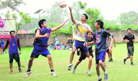 Players in action during a match of the 4th St Soldier Netball Trophy at St Soldiers International School in Sector 28, Chandigarh, on Monday.
