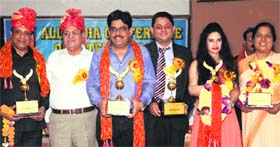 Some of the recipients of the ‘Punjab Rattan’ award at a function in DAV College, Sector 10, Chandigarh, on Monday.