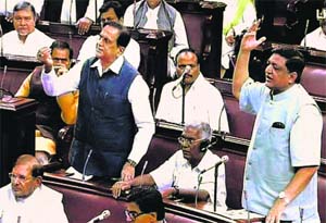 Opposition members during the Budget session in the Rajya Sabha on Monday. PTI 