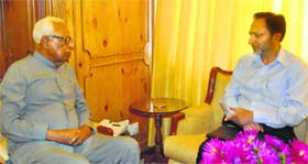 Governor NN Vohra with Prof AM Shah, acting Vice Chancellor, Kashmir University, at Raj Bhawan in Srinagar on Monday.