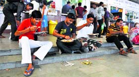 Passengers at the railway station in Jammu.
