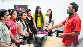 Jiwan Kalia, art director, interacts with students of INIFD in Ludhiana