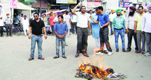 ETT teachers hold a protest in Sangrur on Monday.