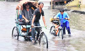 Inundated: The waterlogged Bhagat Singh Square road which leads to BHEL and SIDCUL in Haridwar on Monday