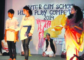 Students present a street play as a part of Inter-CJM Schools street play competition in Mussoorie on Monday
