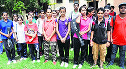 Badminton players of various schools waiting for their game to begin during the zonal tournament at DAV College in Bathinda on Tuesday