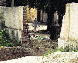 The breached boundary wall of Adarsh School in Canal Colony in Bathinda
