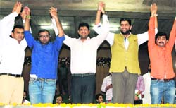 MP Dushyant Chautala (centre) with INSO leaders during the foundation day celebrations of the party at Panjab University, Chandigarh, on Tuesday. Tribune Photo: S Chandan
