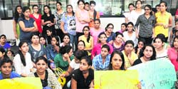 Students protest in support of their demands at SD College, Sector 32, Chandigarh, on Tuesday. Tribune photo: Manoj Mahajan