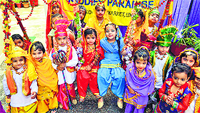 Students of Kiddies Paradise School celebrate Teej on the school premises in Ludhiana. 