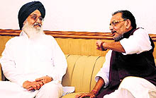PS Badal with Union Minister Radha Mohan Singh in New Delhi on Tuesday