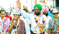 AAP candidate Harjit Singh Adaltiwala campaigns in Patiala on Tuesday