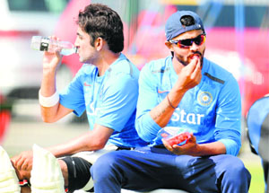 Jadeja (R) and Gambhir look relaxed ahead of the fourth Test against England at Old Trafford, on Tuesday.  The Test begins on Thursday.