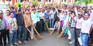 Rashtriya Madhyamik  Siksha Abhiyan workers protest in Dehradun on Tuesday. 