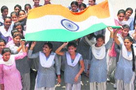 Fervour: Schoolchildren take part in a rehearsal for the Independence Day celebrations at Government Girls Sr Secondary School, Mall road, in Amritsar on Wednesday