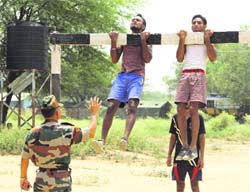 Youths undergo a physical test during an Army recruitment rally in Bathinda cantonment on Wednesday. photo: vijay kumar